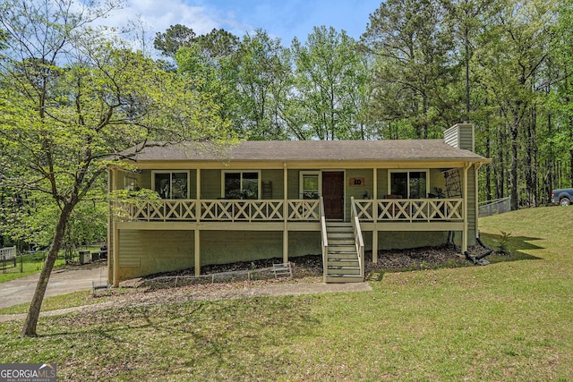 10 Powder Dr, Dallas, GA 30157 - ranch-style home featuring a porch, a front lawn, a chimney, and stairs