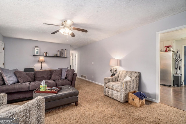 10 Powder Dr, Dallas, GA 30157 - living room featuring carpet flooring, a ceiling fan, a textured ceiling, and baseboards