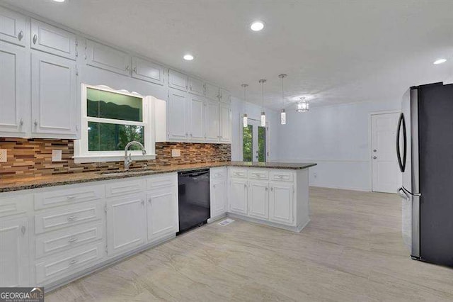9415 Martin Rd, Roswell, GA 30076 - kitchen with dishwasher, freestanding refrigerator, a peninsula, white cabinetry, and recessed lighting