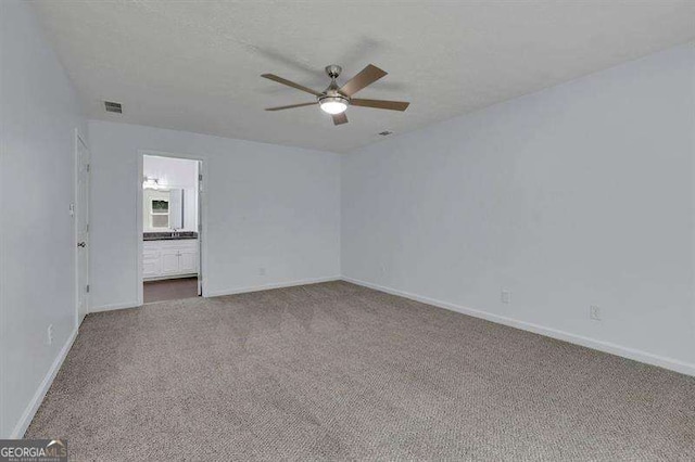 9415 Martin Rd, Roswell, GA 30076 - carpeted spare room with ceiling fan and baseboards