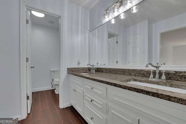 9415 Martin Rd, Roswell, GA 30076 - full bath with double vanity and wood finished floors