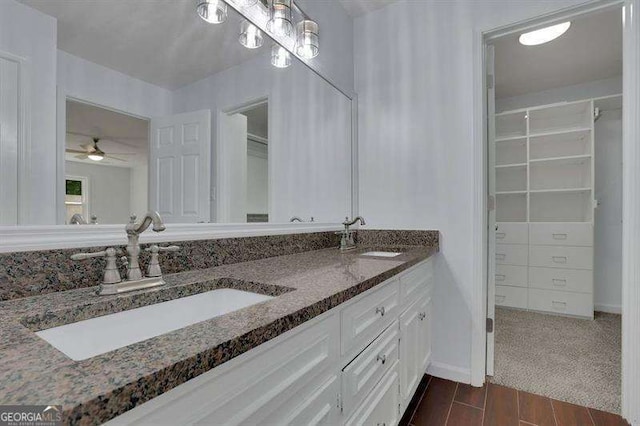 9415 Martin Rd, Roswell, GA 30076 - full bath featuring double vanity, a ceiling fan, and a spacious closet