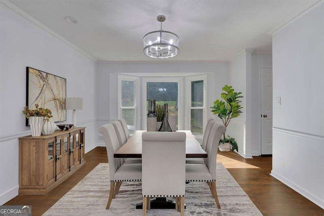 9415 Martin Rd, Roswell, GA 30076 - dining room with a chandelier, ornamental molding, and wood finished floors