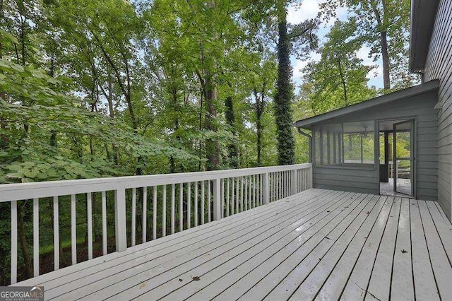 9415 Martin Rd, Roswell, GA 30076 - wooden deck featuring a sunroom