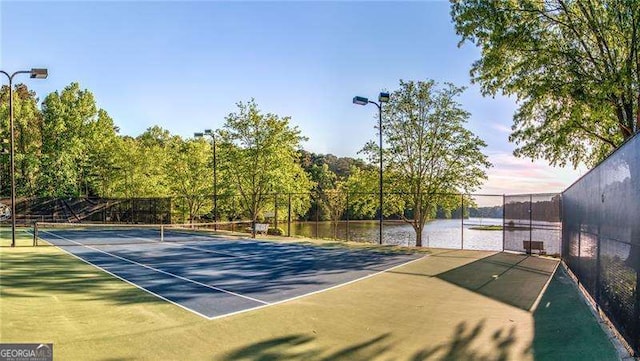 9415 Martin Rd, Roswell, GA 30076 - view of tennis court with a water view