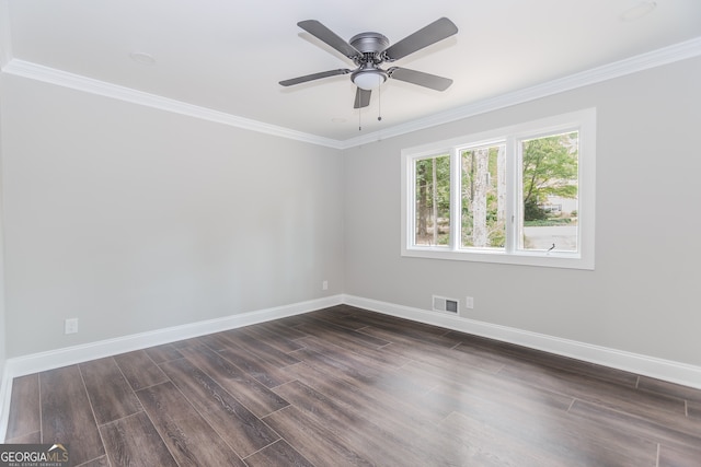 247 Old Timber Rd, Lawrenceville, GA 30046 - unfurnished room featuring dark wood-type flooring, baseboards, ornamental molding, and visible vents