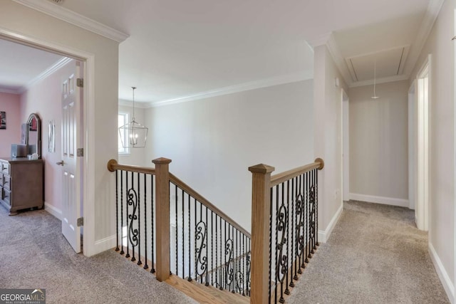 3065 Meadow Springs Dr, Watkinsville, GA 30677 - corridor featuring attic access, carpet floors, ornamental molding, and an upstairs landing