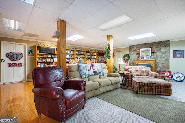 4004 White Oak Ln, Lagrange, GA 30240 - living area featuring a fireplace, wood finished floors, and a drop ceiling