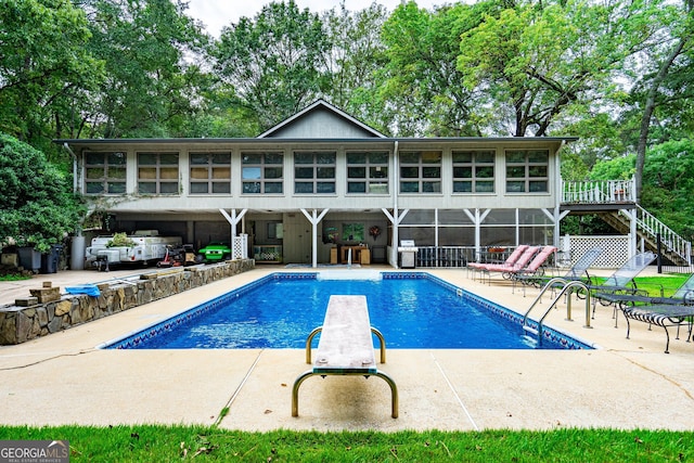 4004 White Oak Ln, Lagrange, GA 30240 - rear view of property with an outdoor pool, stairs, and a patio area