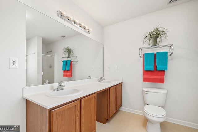 5330 Willow Park Blvd, South Fulton, GA 30349 - full bath with double vanity, an enclosed shower, toilet, and baseboards