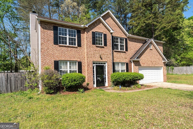 5330 Willow Park Blvd, South Fulton, GA 30349 - view of front of house featuring a chimney, concrete driveway, brick siding, and a garage