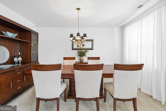 5330 Willow Park Blvd, South Fulton, GA 30349 - dining area featuring a chandelier and light colored carpet
