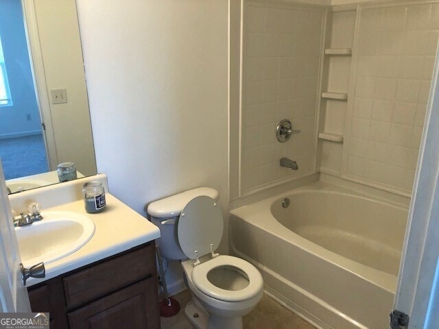 full bath with toilet, shower / tub combination, and vanity