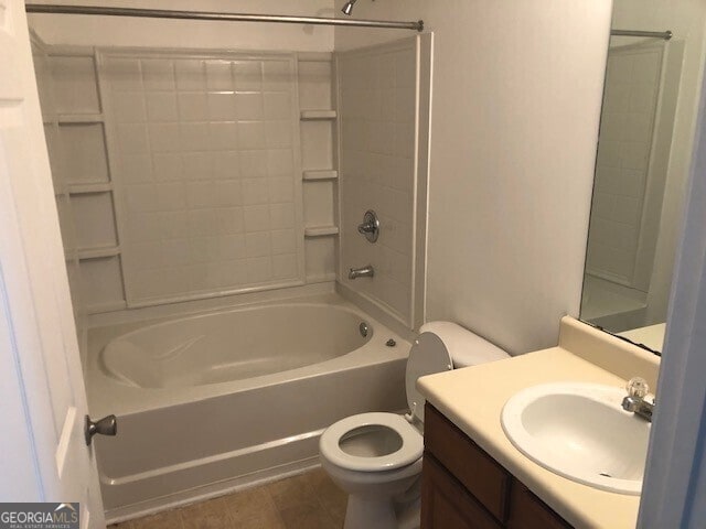 full bath featuring vanity, bathtub / shower combination, and toilet