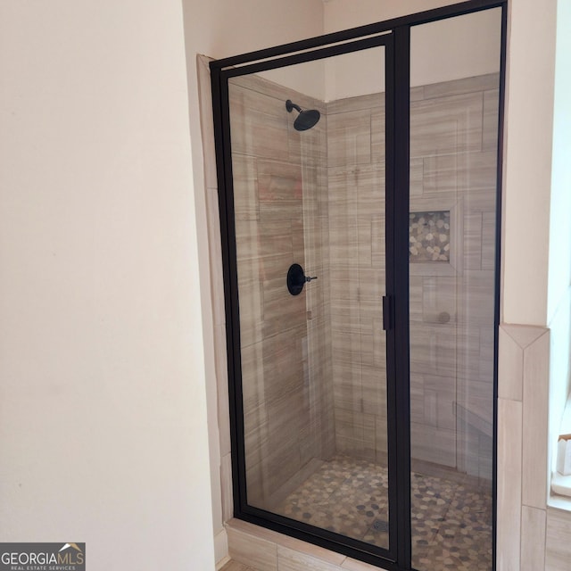 full bathroom with a stall shower