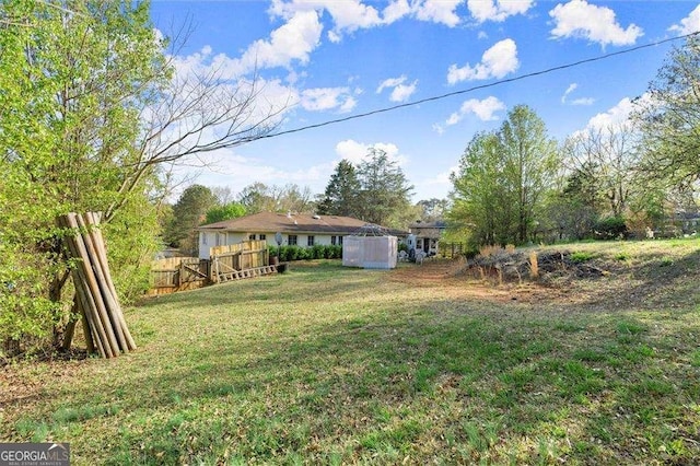 view of yard featuring fence