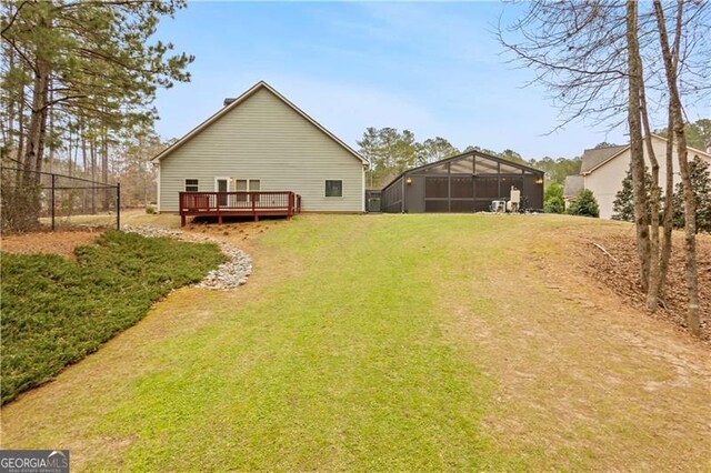 view of yard featuring a wooden deck