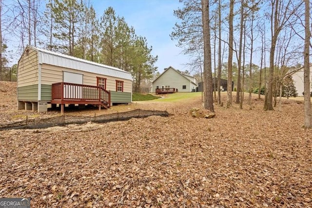 view of yard with a deck