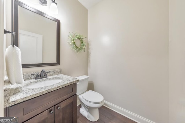 64 Durana Way, Dallas, GA 30132 - half bathroom with vanity and wood finished floors