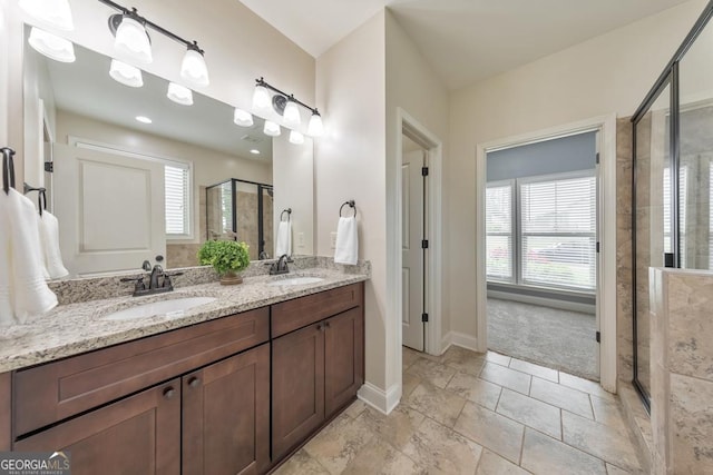 64 Durana Way, Dallas, GA 30132 - full bathroom with a shower stall, healthy amount of natural light, and double vanity