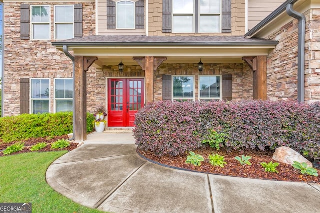 64 Durana Way, Dallas, GA 30132 - doorway to property with stone siding, french doors, a porch, and a shingled roof