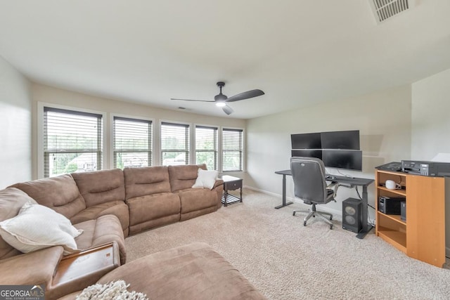 64 Durana Way, Dallas, GA 30132 - living room with a ceiling fan, carpet, and a desk