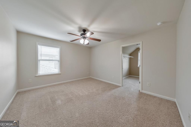 64 Durana Way, Dallas, GA 30132 - spare room with a ceiling fan and light colored carpet