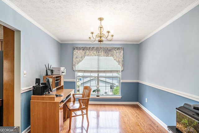 home office featuring ornamental molding, a textured ceiling, wood finished floors, and a chandelier