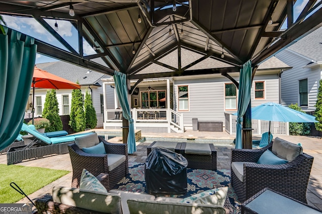 319 Riverton Way, Woodstock, GA 30188 - view of patio featuring outdoor lounge area, a gazebo, ceiling fan, and a wooden deck
