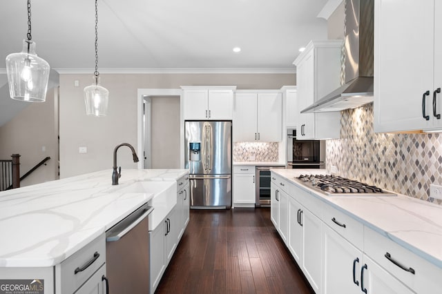 319 Riverton Way, Woodstock, GA 30188 - kitchen featuring appliances with stainless steel finishes, wall chimney exhaust hood, crown molding, a sink, and decorative backsplash