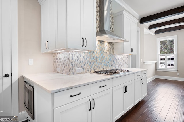 319 Riverton Way, Woodstock, GA 30188 - kitchen with wall chimney exhaust hood, decorative backsplash, stainless steel appliances, beam ceiling, and dark wood-style floors