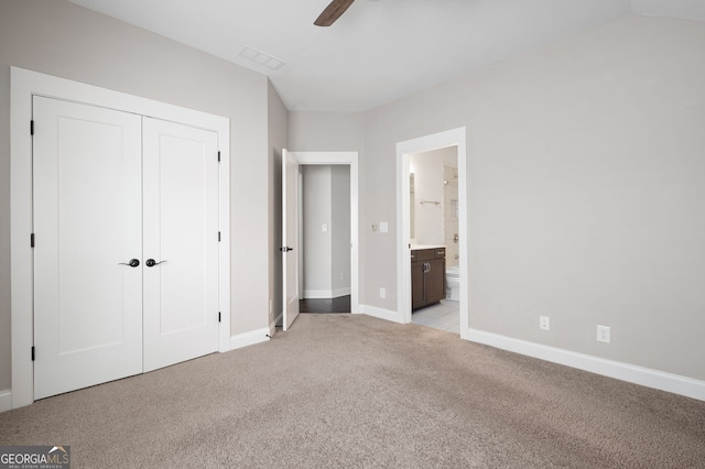 319 Riverton Way, Woodstock, GA 30188 - unfurnished bedroom featuring light carpet, baseboards, and a closet