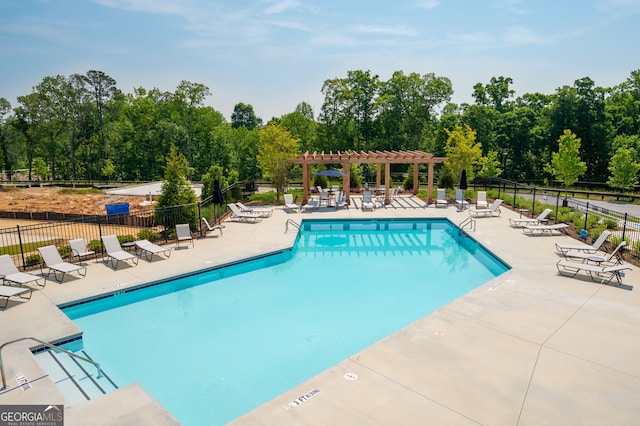 319 Riverton Way, Woodstock, GA 30188 - community pool featuring a pergola, a patio area, and view of scattered trees