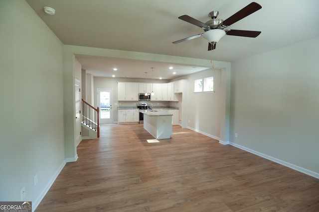 113 Sharp St, Bremen, GA 30110 - kitchen with appliances with stainless steel finishes, open floor plan, baseboards, and recessed lighting