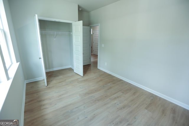113 Sharp St, Bremen, GA 30110 - unfurnished bedroom with wood finished floors, a closet, and baseboards