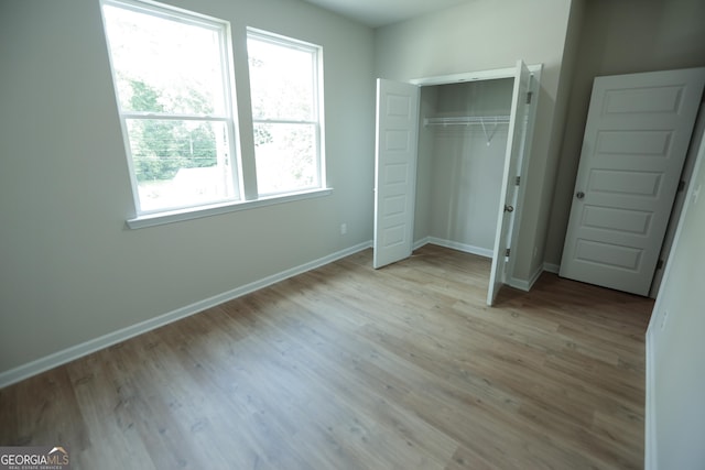 113 Sharp St, Bremen, GA 30110 - unfurnished bedroom with baseboards, wood finished floors, and a closet