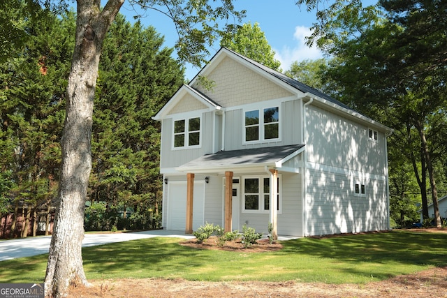 113 Sharp St, Bremen, GA 30110 - view of front of property with an attached garage, driveway, and a front lawn