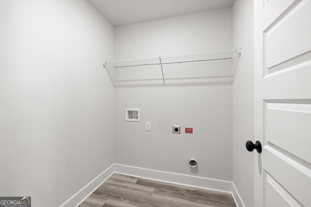 387 Liberty Hill Rd Unit 20, Hartwell, GA 30643 - clothes washing area featuring washer hookup, baseboards, wood finished floors, laundry area, and hookup for an electric dryer