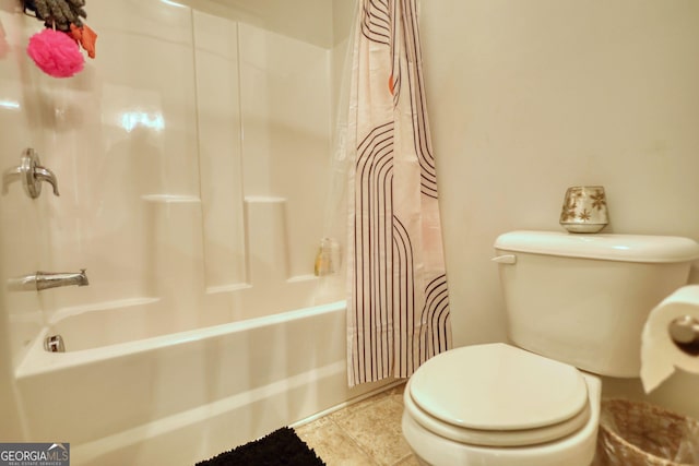 164 Madison Grace Ave, Mcdonough, GA 30252 - bathroom featuring tile patterned flooring, toilet, and shower / tub combo with curtain