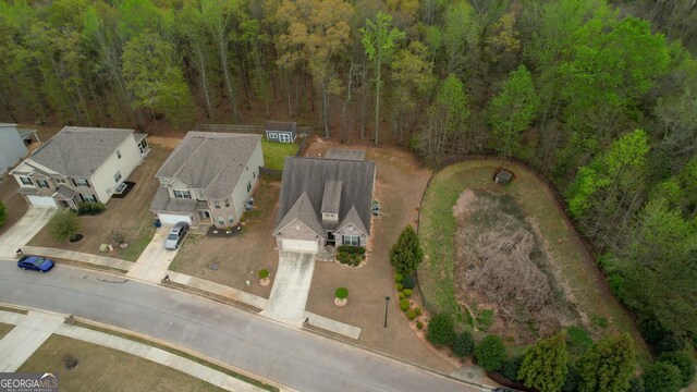 164 Madison Grace Ave, Mcdonough, GA 30252 - drone / aerial view with a wooded view