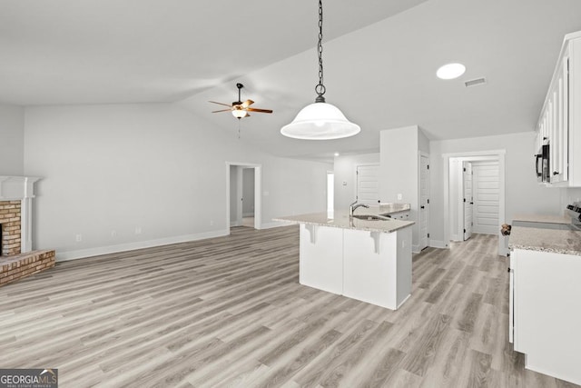 357 Liberty Hill Rd Unit 18, Hartwell, GA 30643 - kitchen featuring white cabinets, ceiling fan, a sink, black microwave, and decorative light fixtures