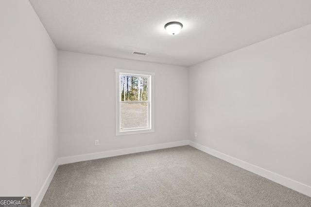357 Liberty Hill Rd Unit 18, Hartwell, GA 30643 - unfurnished room with carpet, baseboards, a textured ceiling, and visible vents