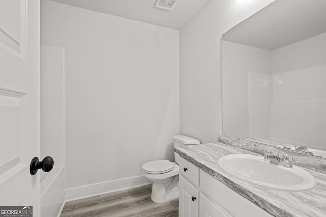 357 Liberty Hill Rd Unit 18, Hartwell, GA 30643 - full bathroom with visible vents, baseboards, toilet, wood finished floors, and vanity