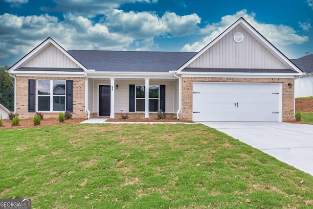357 Liberty Hill Rd Unit 18, Hartwell, GA 30643 - view of front of home with a garage, concrete driveway, brick siding, a front lawn, and board and batten siding