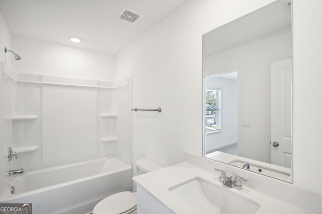 full bathroom featuring toilet, vanity, shower / bathing tub combination, and visible vents