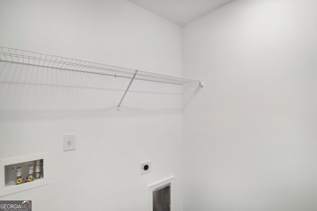 washroom with hookup for an electric dryer, laundry area, and washer hookup