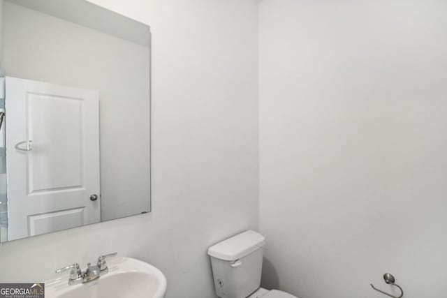 330 White Tail Rd, Stockbridge, GA 30253 - bathroom featuring toilet and a sink