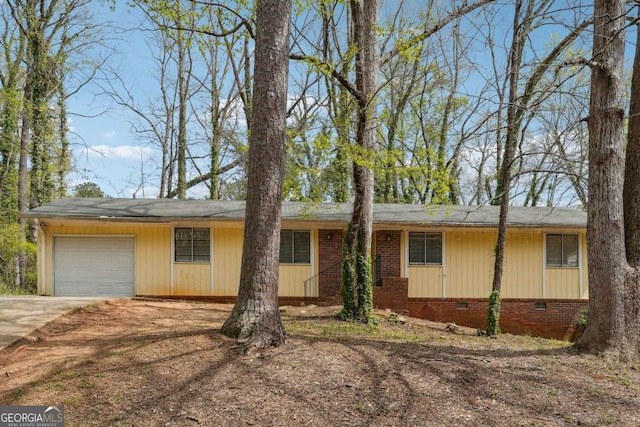 1360 Cypress Ridge Cir, Stone Mountain, GA 30083 - ranch-style house with a garage, concrete driveway, and crawl space