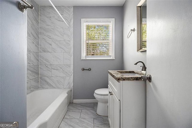 bathroom featuring toilet, vanity, shower / bathtub combination, marble finish floor, and baseboards