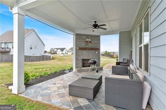 95 Summerlyn Dr, Hiram, GA 30141 - view of patio with a ceiling fan, an outdoor living space with a fireplace, and a residential view